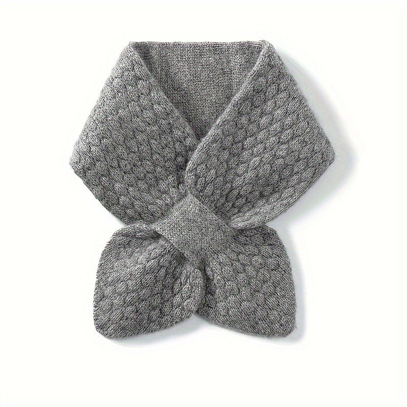 Autumn women's accessory: a stylish knitted neck warmer for cold weather protection.