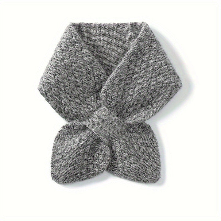 Autumn women's accessory: a stylish knitted neck warmer for cold weather protection.