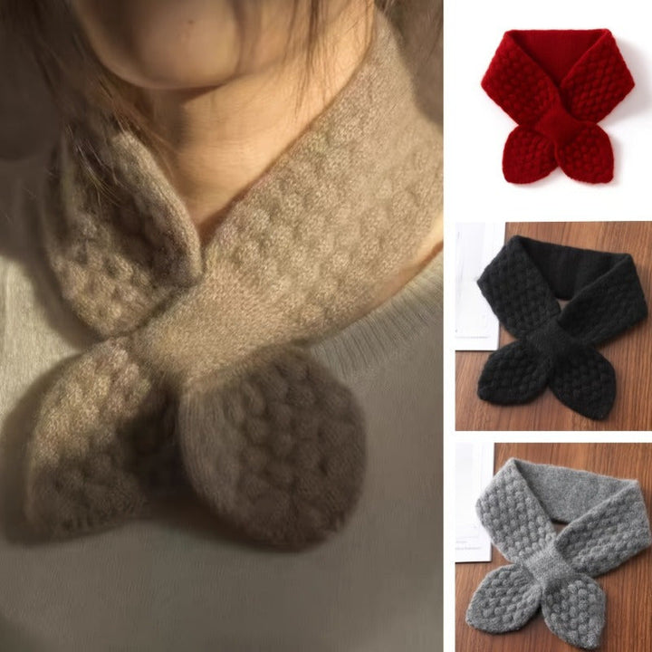 Close-up of a women's cozy knitted neck warmer, providing warmth and comfort.