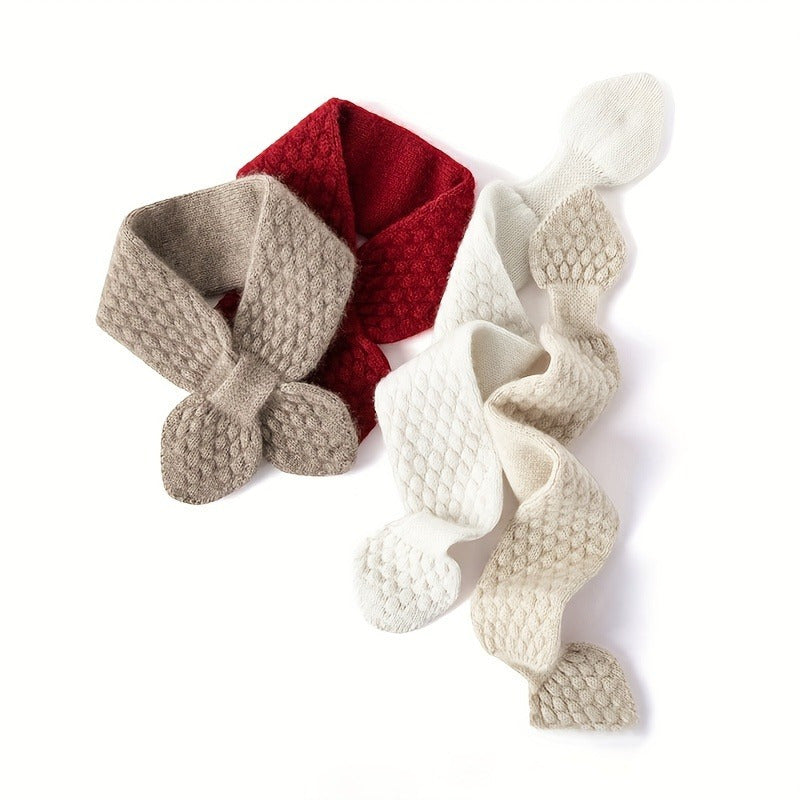 Essential women's winter accessory: a warm, soft knitted neck warmer for cold weather.