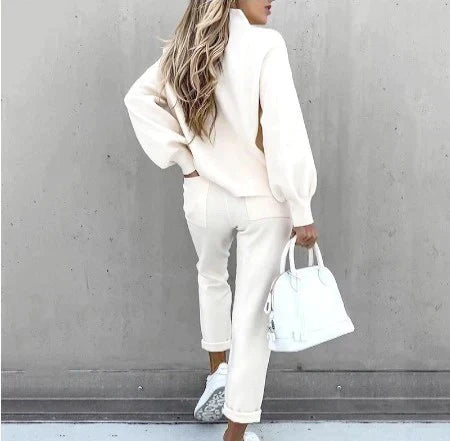 Full shot of women's comfortable loungewear set, including a long-sleeved sweatshirt and elastic-waist joggers.