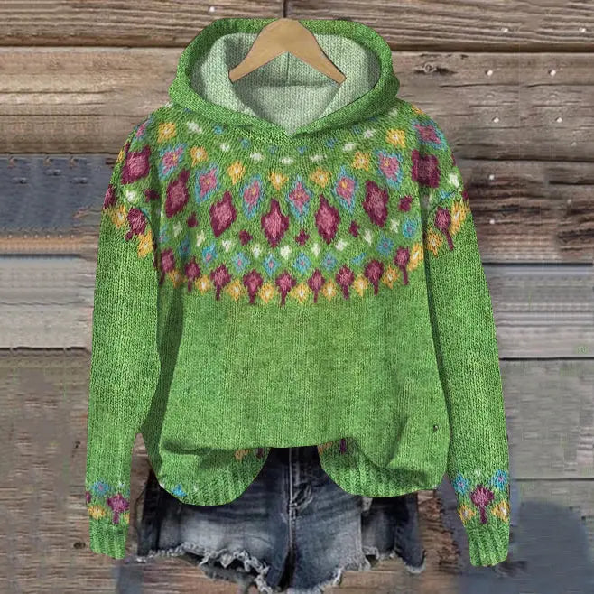 Warm women's pullover hoodie with traditional Nordic pattern, ideal for cozy winter layering and everyday wear.