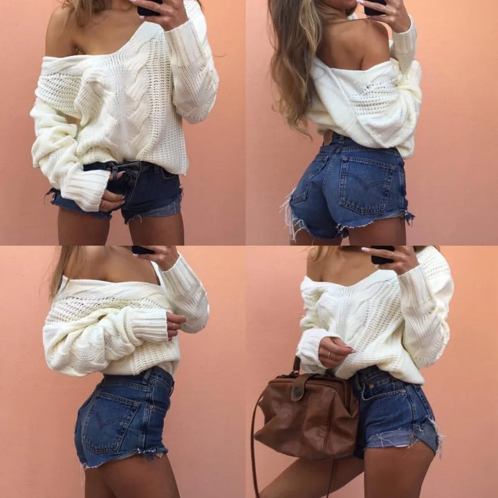 Fashionable women's oversized knitted sweater with long sleeves, ideal for cozy casual wear.
