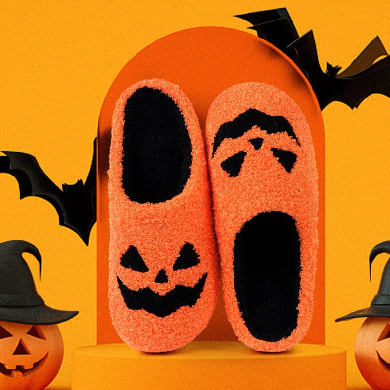Soft women's Halloween house slippers with both pumpkin and ghost plush appliques.