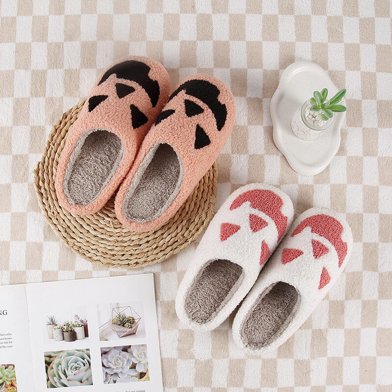 Detail shot of the non-slip sole on a women's ghost plush house slipper.
