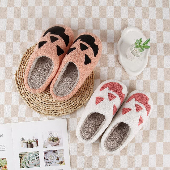 Detail shot of the non-slip sole on a women's ghost plush house slipper.