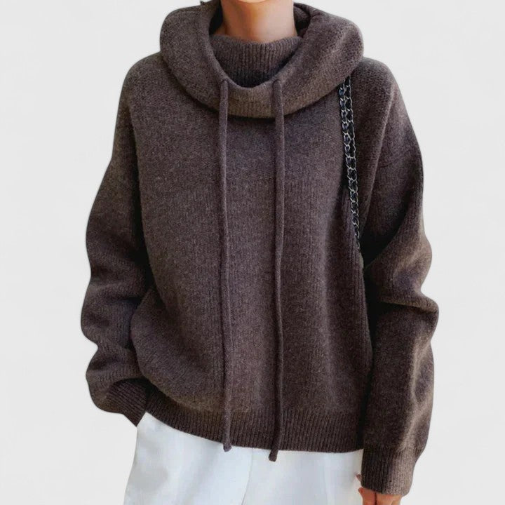 Relaxed fit women's oversized pullover sweater featuring a stylish drawstring cowl neck for cozy winter wear.