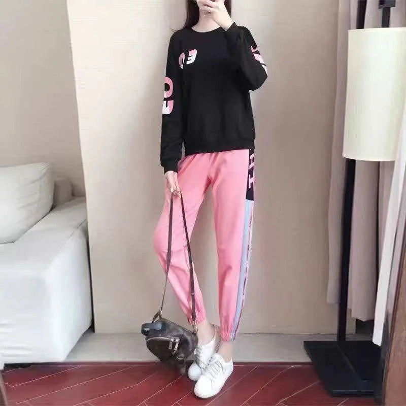 Women's fall fashion tracksuit outfit; a cozy long-sleeve sweater and comfortable pants for casual wear.