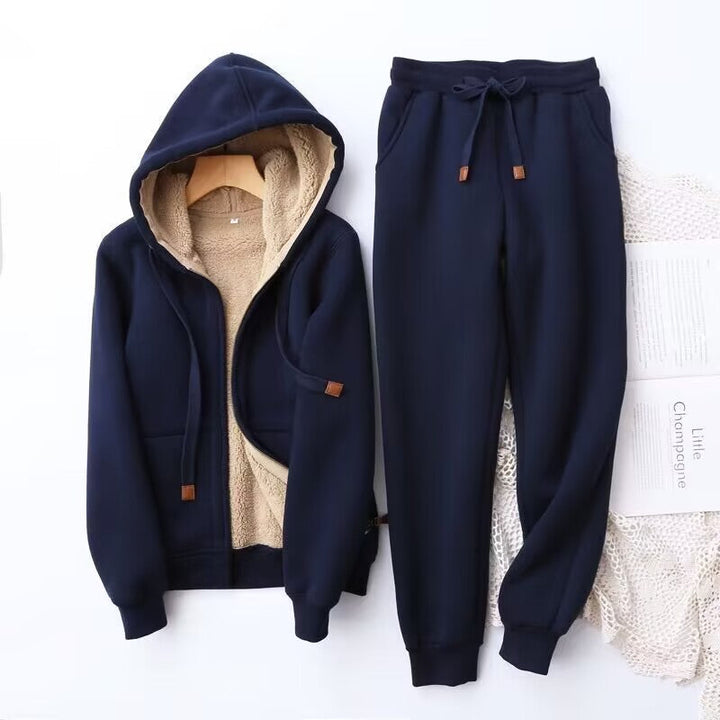 Warm and stylish women's jogger and hoodie set in a blush pink, offering a cozy and casual outfit for cool weather.