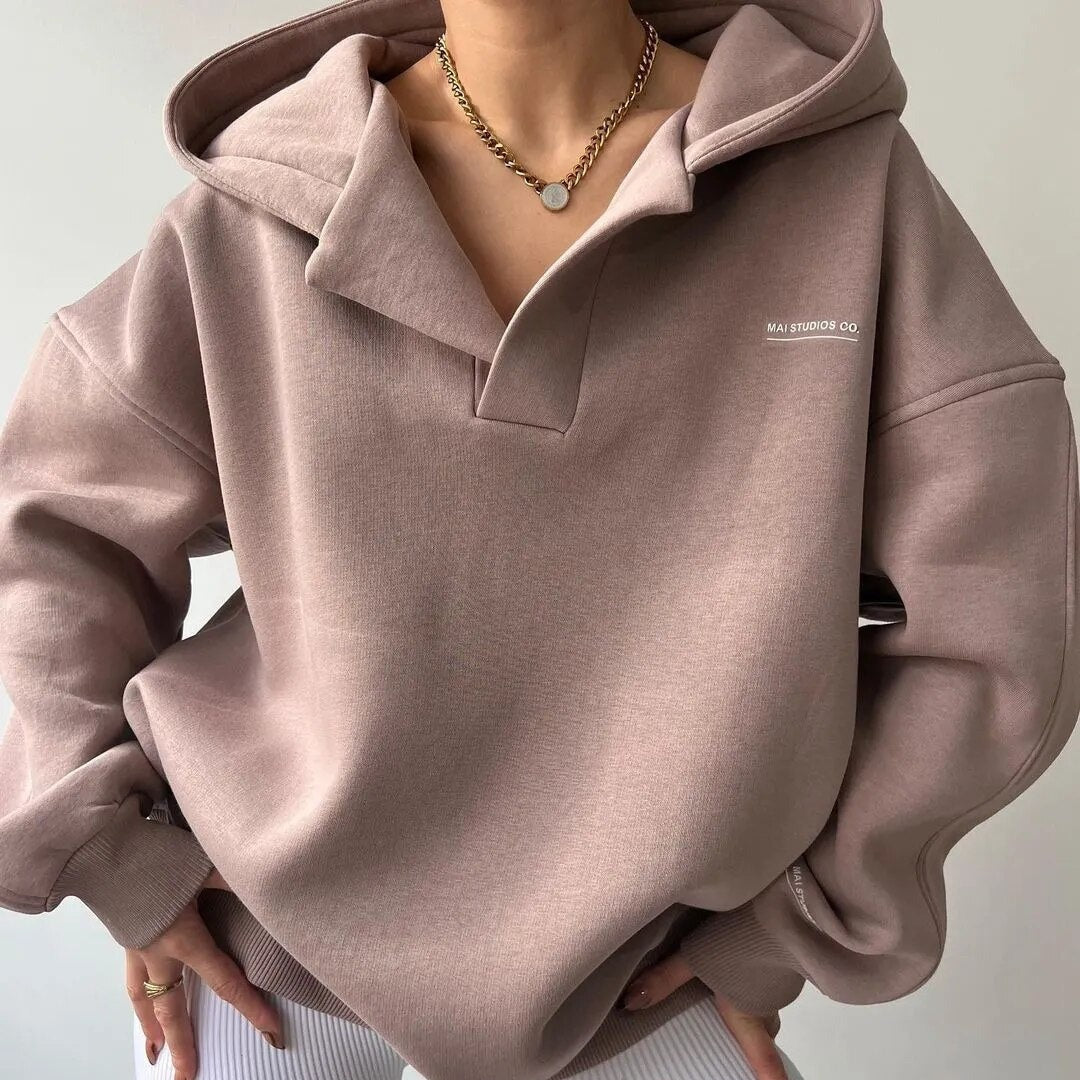 Cozy women's winter hoodie, warm long-sleeve pullover for everyday comfort & casual style.