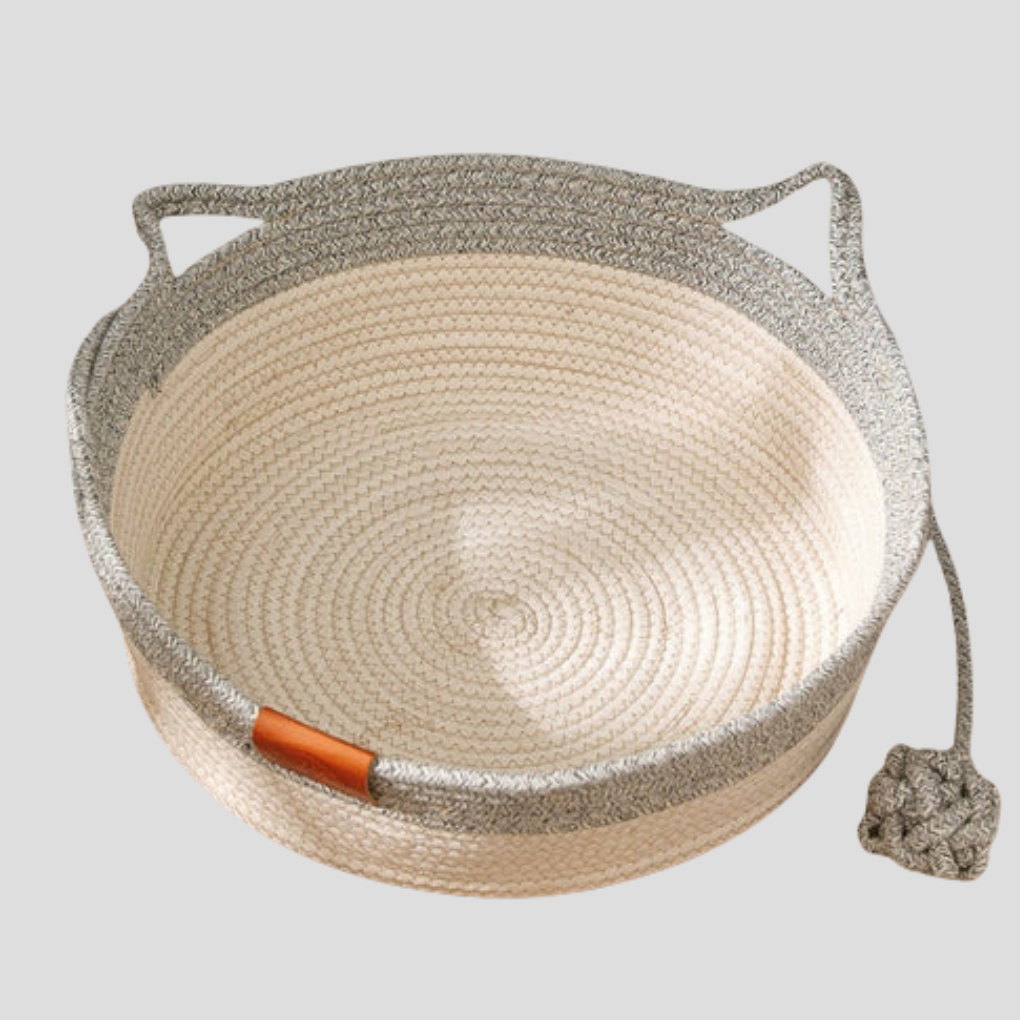 Cozy woven cotton rope cat bed, perfect for lounging & play. Durable pet comfort furniture for indoor cats.