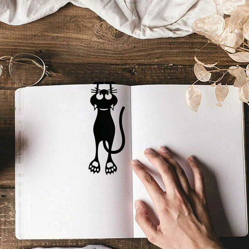 Black cat shaped bookmark, a cute reading accessory and gift for book lovers and stationery enthusiasts.