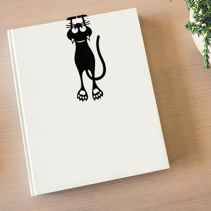 Handcrafted black cat bookmark, a cute kitten pagemarker for animal lovers and stationery collectors.