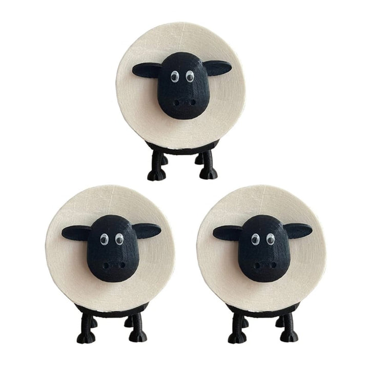 Hand placing a toilet paper roll onto a black sheep holder, demonstrating easy access & storage