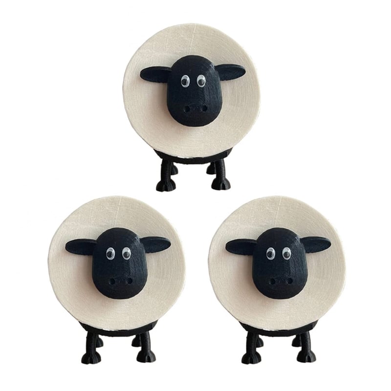 A line of cute sheep toilet paper holders, various colors, ideal for stylish bathroom organization