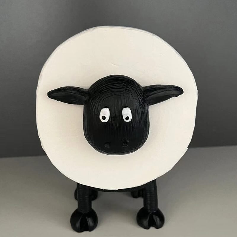 Black sheep toilet paper holder, standing on a bathroom floor, functional & cute organizer