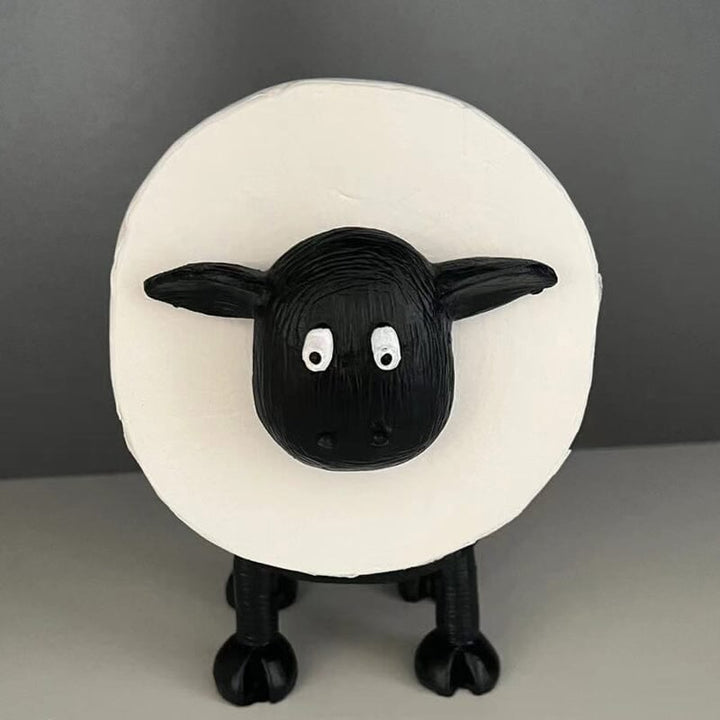 Black sheep toilet paper holder, standing on a bathroom floor, functional & cute organizer
