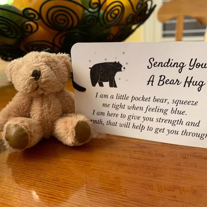 Small pocket bear plush toy keychain with a metallic ring, perfect as a cute accessory or bag charm.