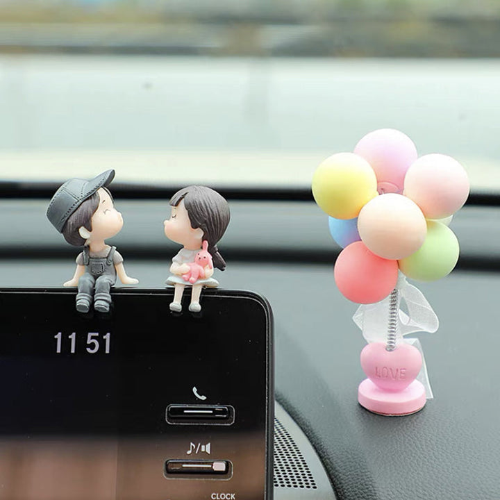 Creative cute couple car dashboard ornament, resin, an expressive romantic decor piece.