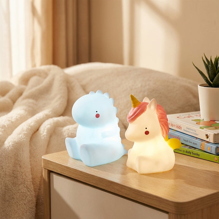 Cute Dreamasaur LED night lamp for kids' bedroom, soft glow dinosaur light, perfect children's nursery gift.