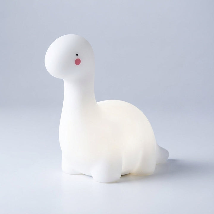 Adorable Dreamasaur LED night lamp for kids' bedroom. Cute animal shape with a gentle, comforting glow.