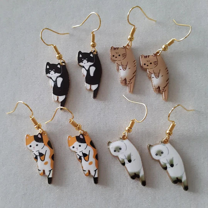 Whimsical cat silhouette drop earrings, a charming accessory for any animal jewelry enthusiast.