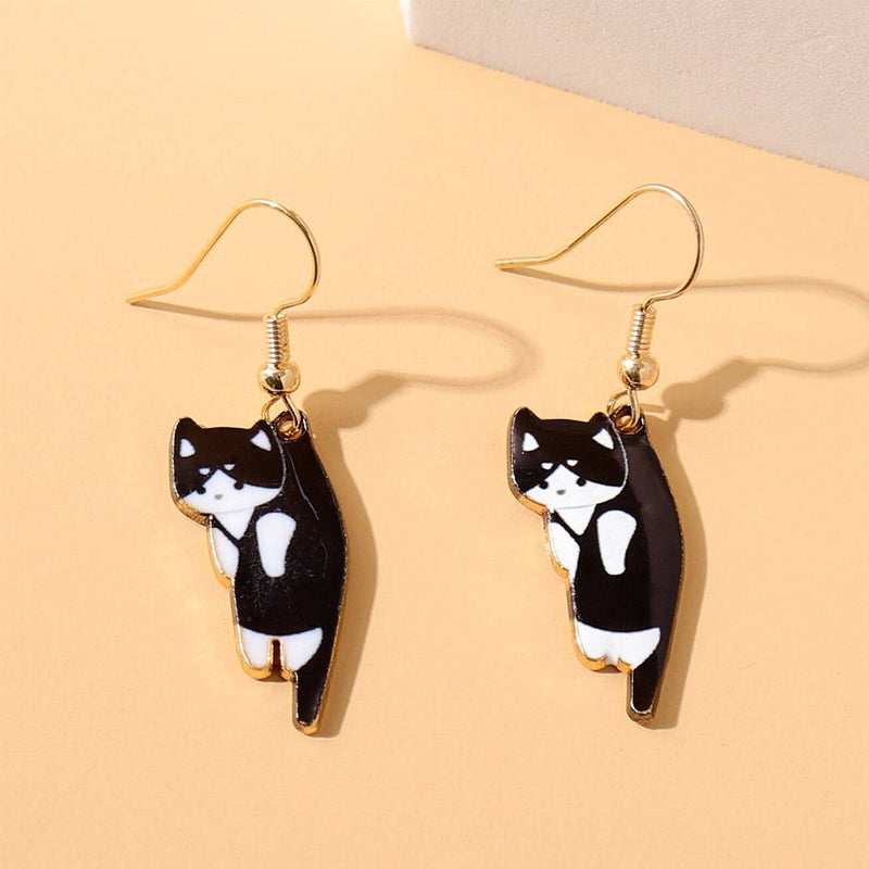 Playful cat head dangle earrings, a must-have fashion accessory for casual or dressy wear.