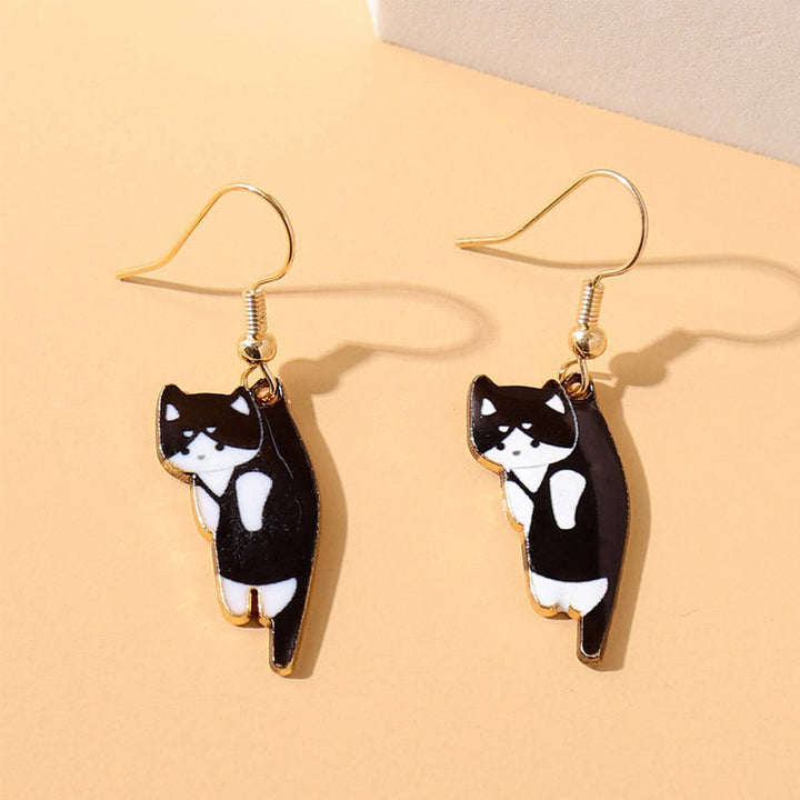 Playful cat head dangle earrings, a must-have fashion accessory for casual or dressy wear.