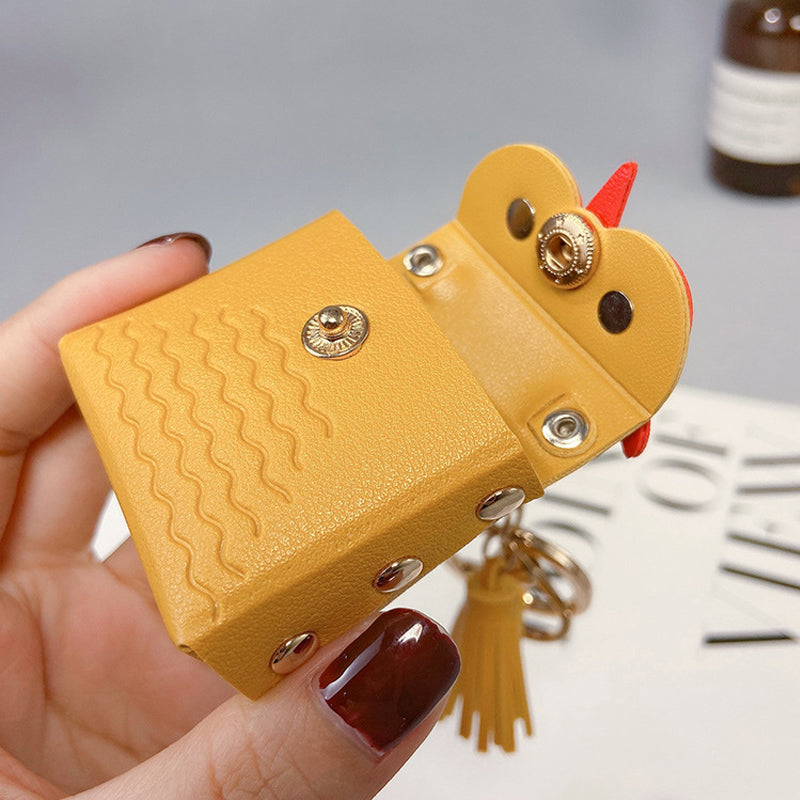 Fashionable blue mini handbag keychain with gold-tone hardware, ideal for women's storage