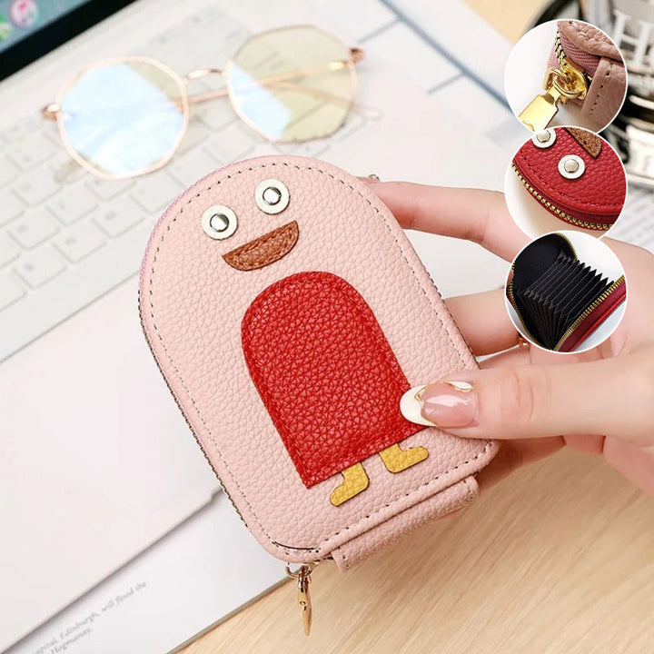 Compact women's wallet featuring a cute penguin graphic, made of PU leather.