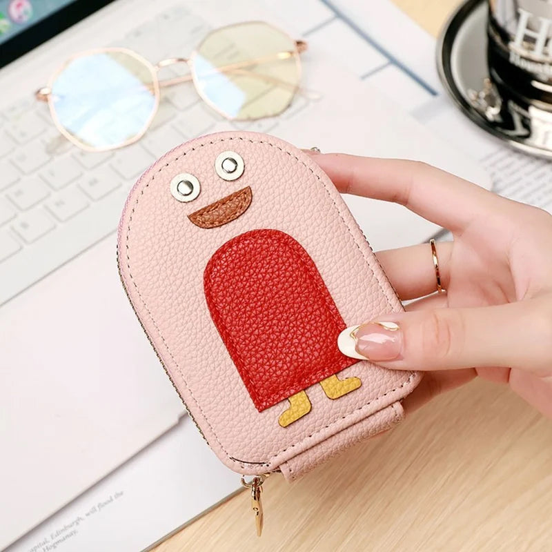Open view of a cute penguin PU leather women's wallet showing card slots & coin pocket.