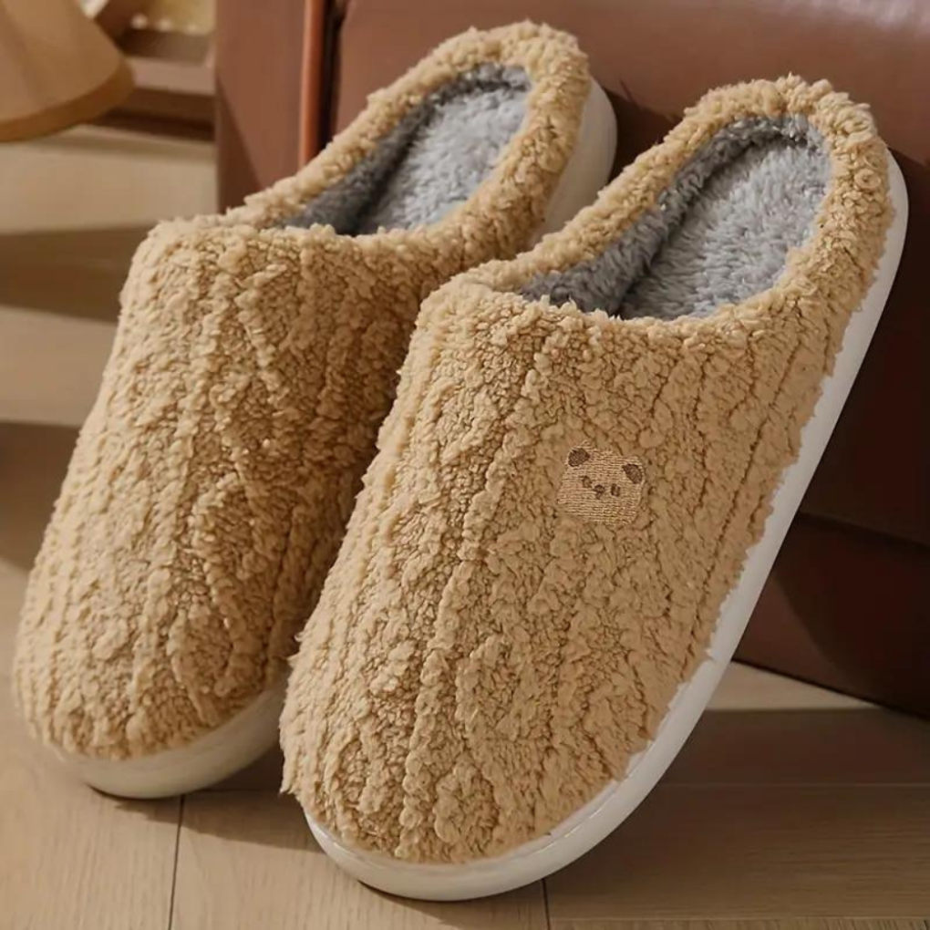 Soft women's plush spring slippers in a cute style, ideal comfort footwear for indoor use.