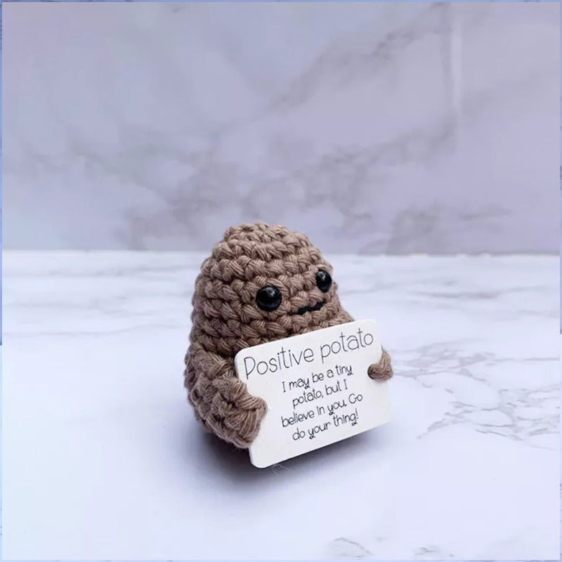 Collection of various positive potato knitted dolls, a range of funny motivational gifts for Christmas.