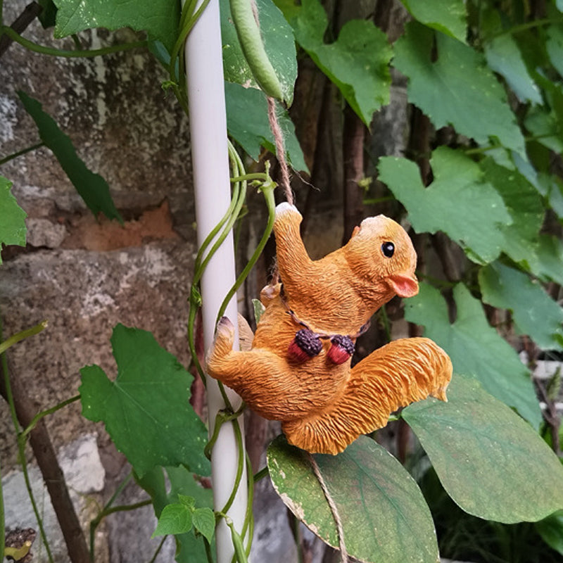 Charming bear cub tree hugger resin ornament, ideal for playful garden landscaping.
