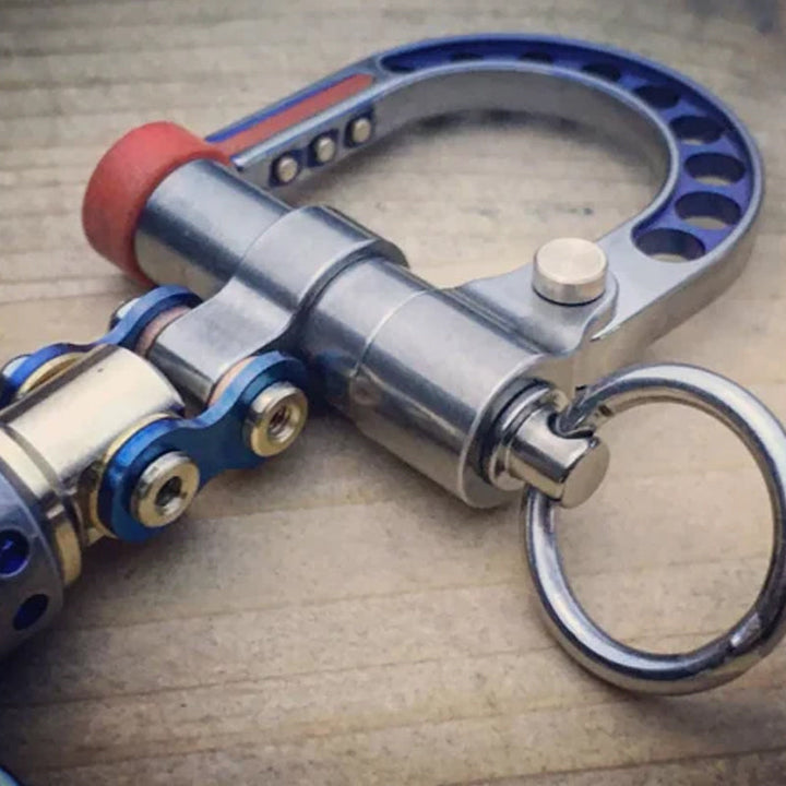 Close-up on the secure clasp of a cyberpunk metal keychain, demonstrating durability. Keywords: metal, keychain, durable