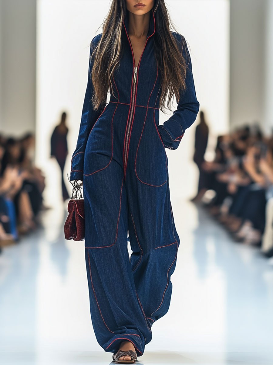 Dark blue wide leg jumpsuit for women with long sleeves & zip front. Perfect for smart casual occasions.