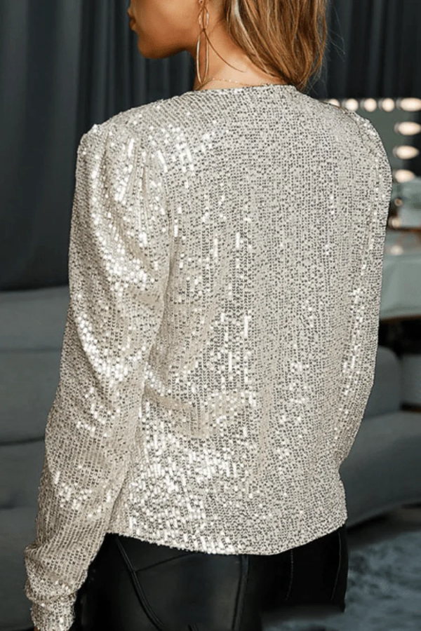 Sparkling silver sequin blazer, an open-front women's jacket for dazzling party and holiday outfits.