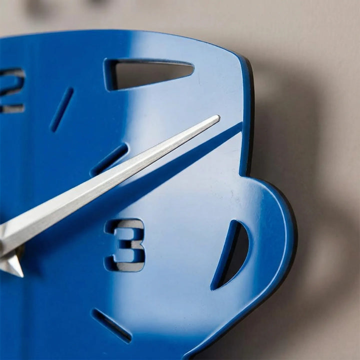 Stylish blue coffee decor wall clock, a charming and decorative timepiece for any kitchen.