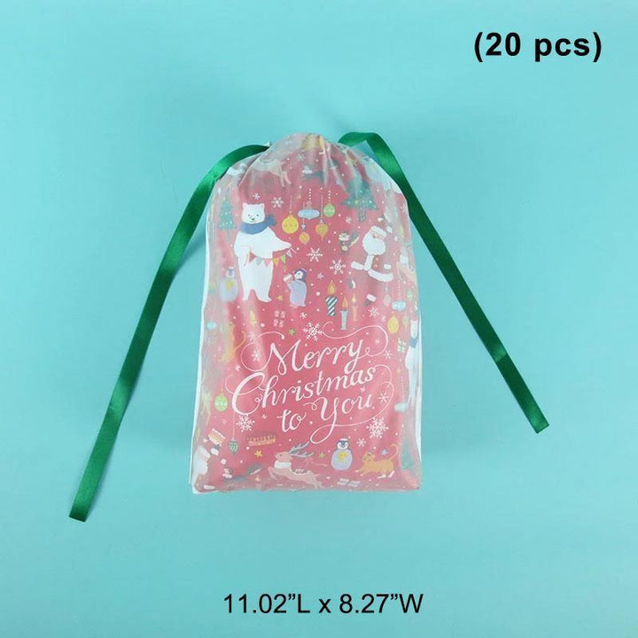 Reusable green Christmas gift bag featuring a Santa Claus print, great for holiday presents.