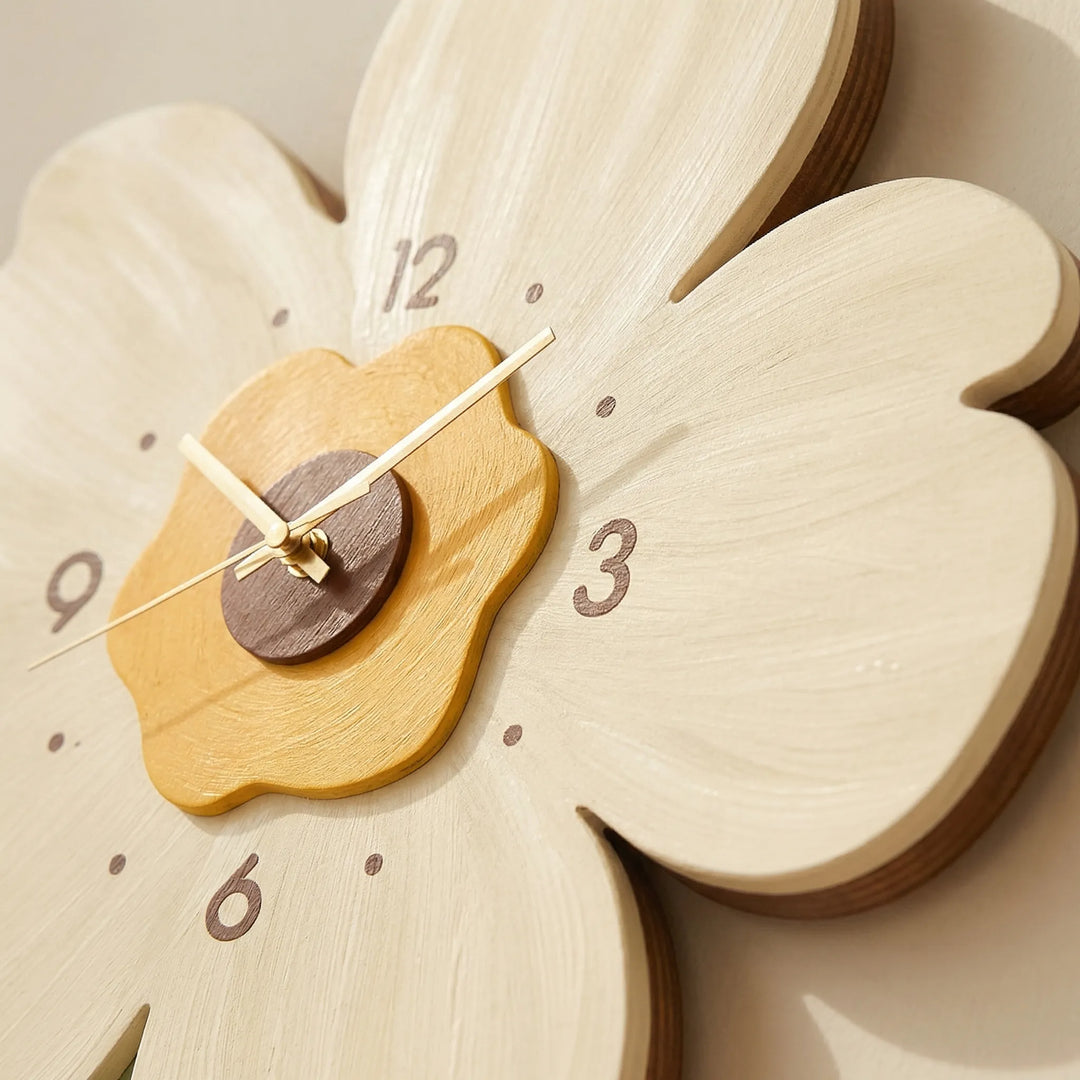 Stylish white and pink flower wall clock, a charming home accent for any modern interior.