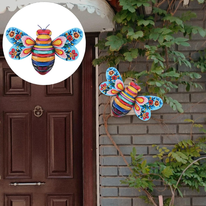 Intricate iron bee wall art, ideal for adding a nature-inspired touch to gardens & living spaces.