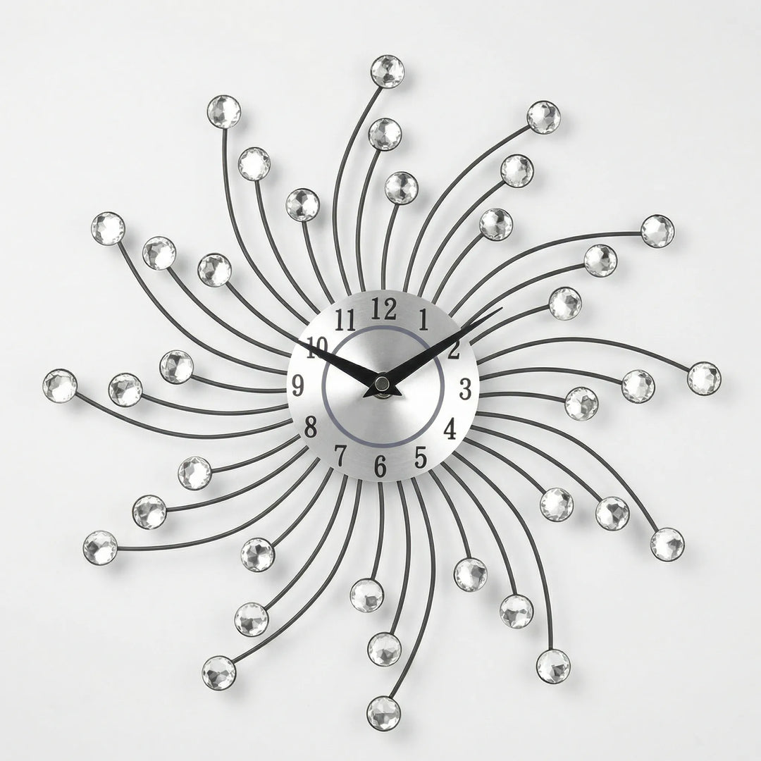 Elegant sunburst wall clock featuring a metallic finish & sparkling details. Ideal silent decorative clock for home decor.