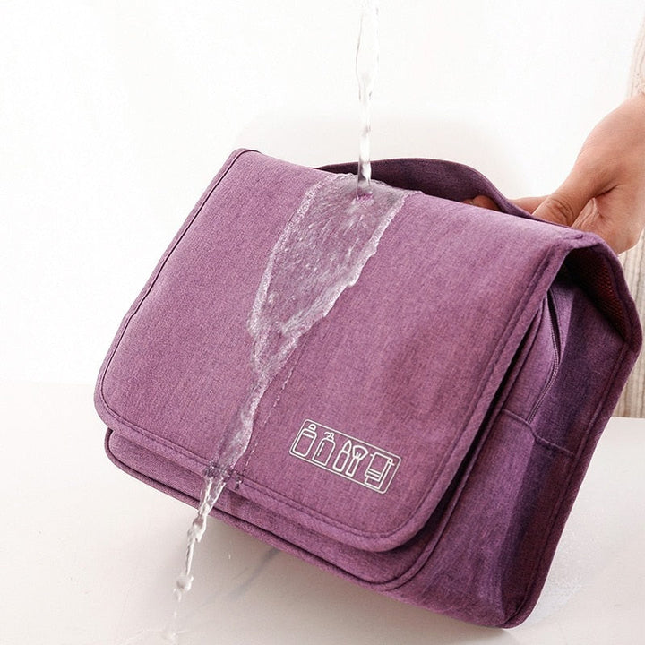 Multi-compartment toiletry bag, perfect for organized travel of bathroom essentials.