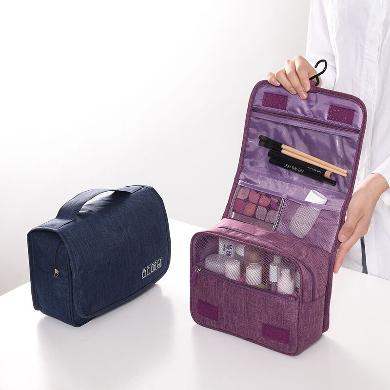 Hanging travel bag for bathroom essentials, easy access & space-saving design.