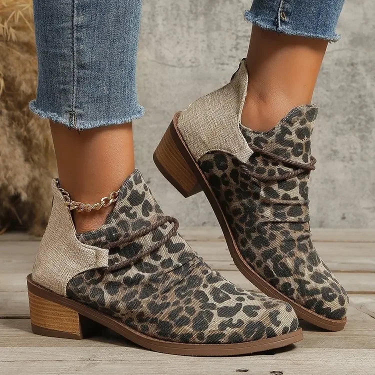 Elegant women's leopard print woven textile boots, comfortable block heel for everyday.
