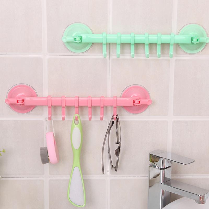 Versatile suction cup hook for bathroom organization, holding loofah, reusable