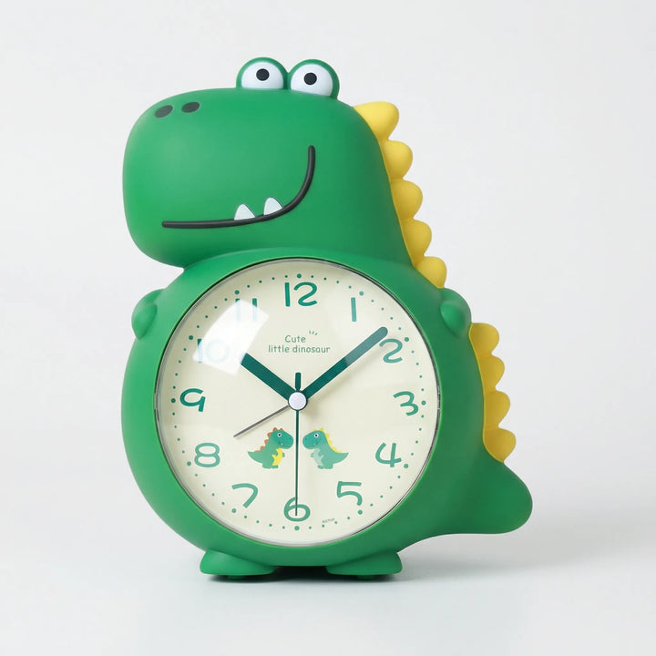 Battery-operated DinoRise kids dinosaur alarm clock, silent movement, gentle wake-up light for child's bedside.