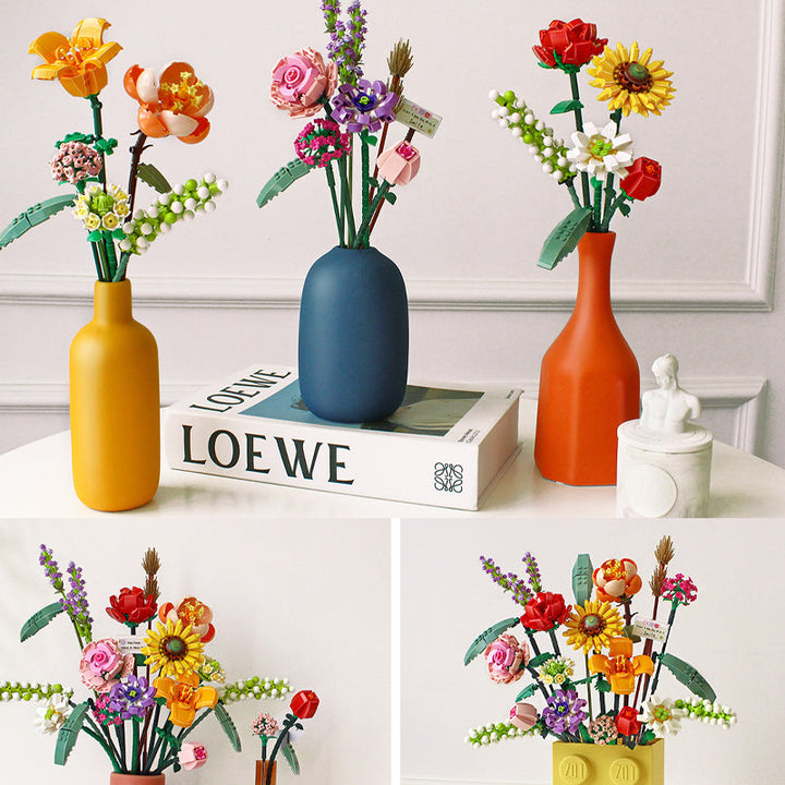 Various plastic flowers from a DIY botanical building kit, ready for assembly.