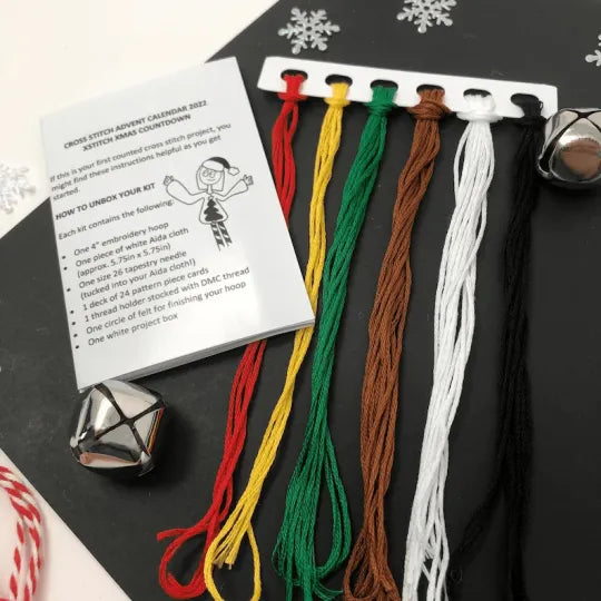 Holiday DIY cross stitch Advent Calendar with colorful threads