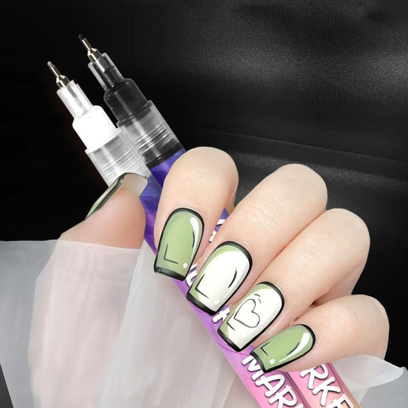 Close-up of DIY nail art doodle pens, showing fine tips for precise manicure detailing & designs